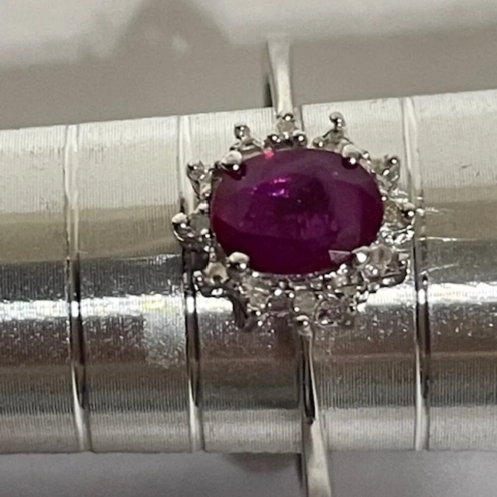 Sterling silver and red gemstone ring. Appx. size 6 1/4.
